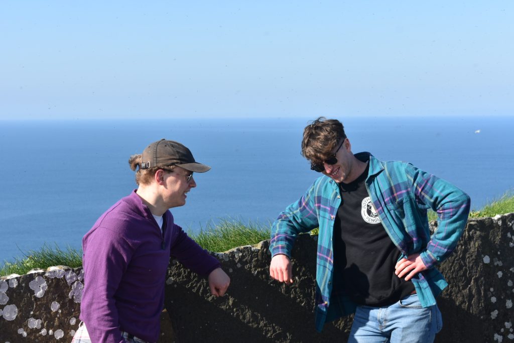 Two friends Two friends on a cliff walk