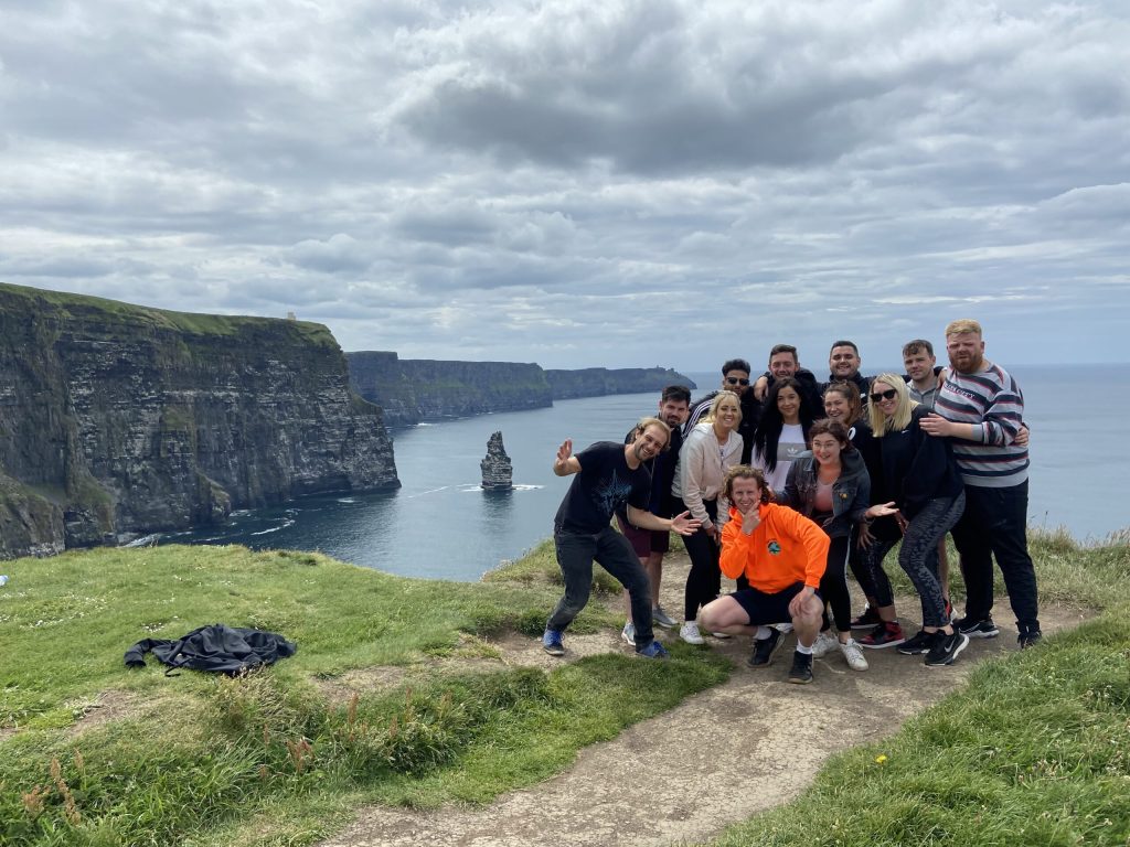 IMG_0709-scaled Ollie posing with group of tourists on Cliffs of Moher