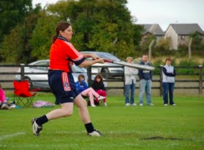 a group of people playing football on a field