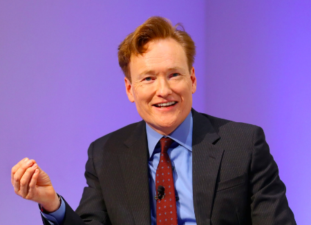 Conan O'Brien wearing a suit and tie